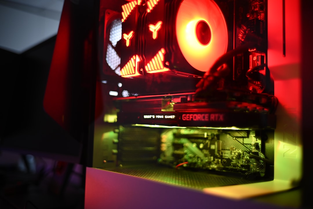 Close-up of computer hardware with red LED lighting inside a server case