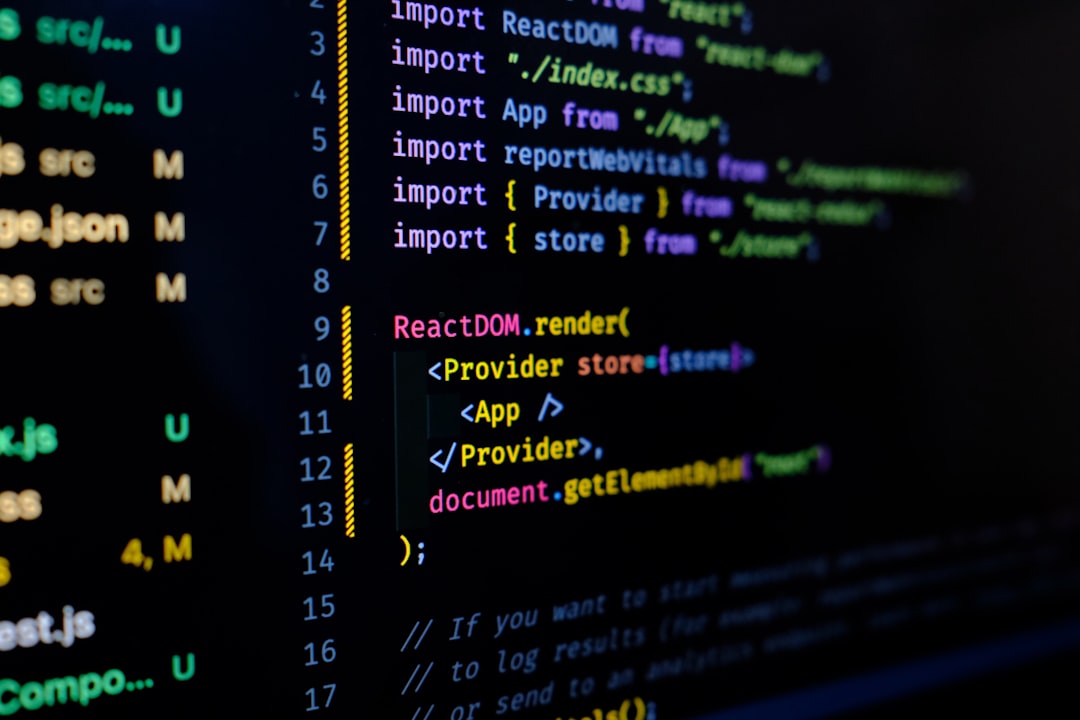 Code displayed on a monitor screen in a dark environment
